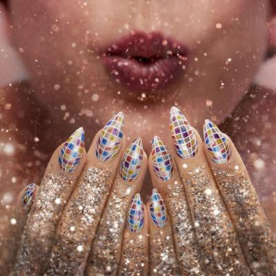CND Shellac Glittercore nail look with glitter tips and mosaic accent nails