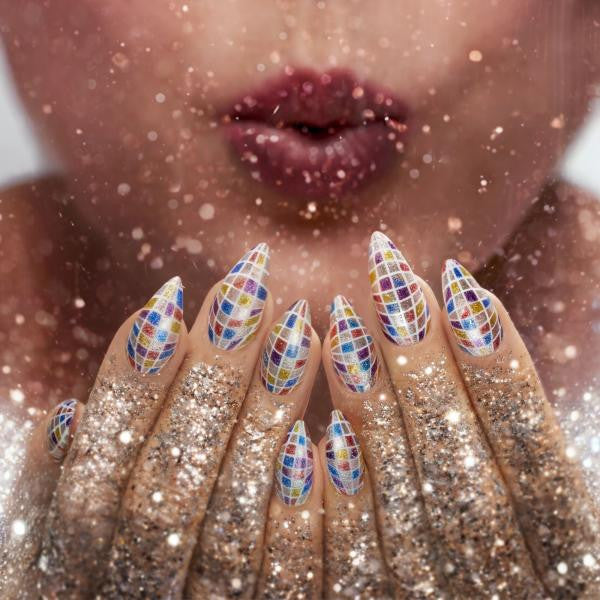 CND Shellac Glittercore nail look with glitter tips and mosaic accent nails