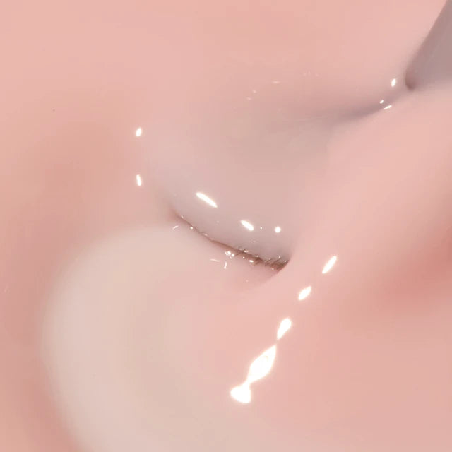 The GelBottle Fibre BIAB Dolly texture close-up with brush