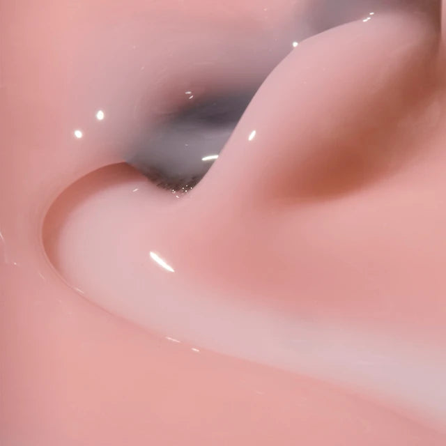 The GelBottle Hard BIAB Blush texture close-up with brush