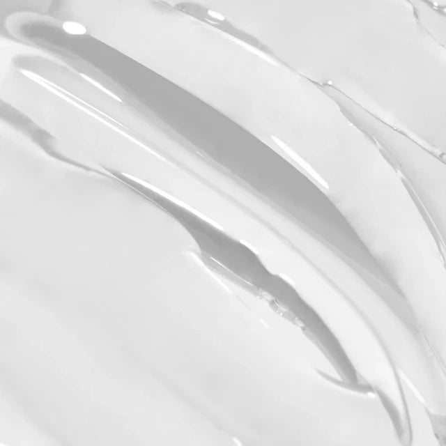 The GelBottle Hard BIAB Clear texture close-up with brush