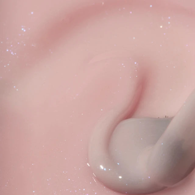 The GelBottle Hard BIAB Luna texture close-up with brush
