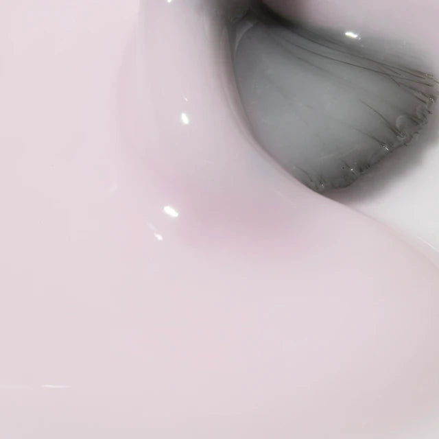 The GelBottle Hard BIAB Pillow texture close-up with brush