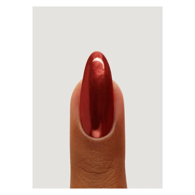 The GelBottle Ruby Chrome Pigment on a nail