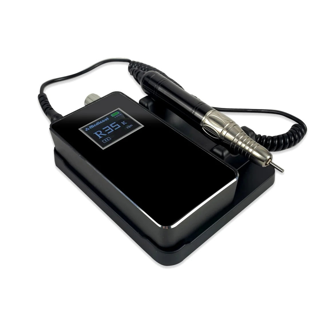 Medicool Pro Power Elite e-file in Black lying in its cradle with the handpiece