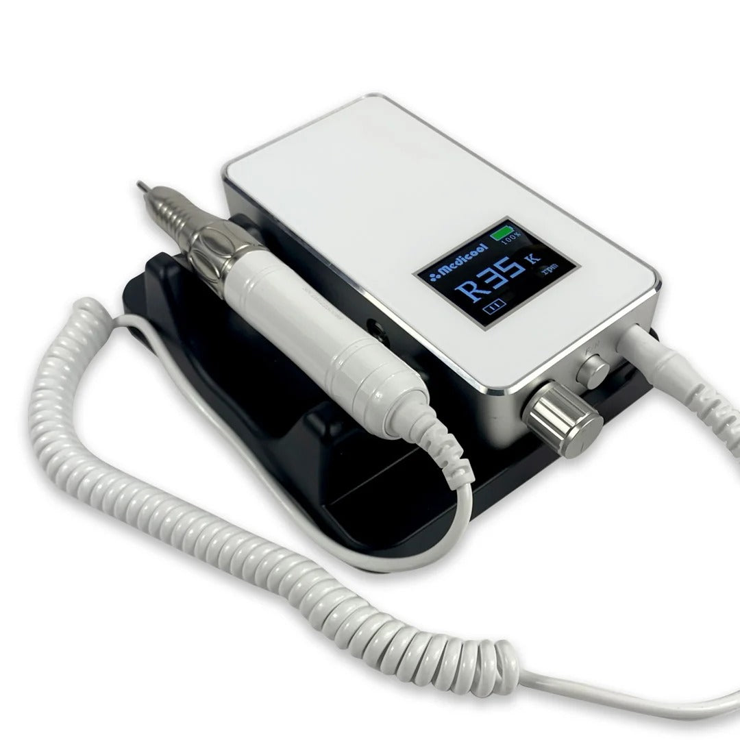 Medicool Pro Power Elite e-file in White lying in its cradle with the handpiece