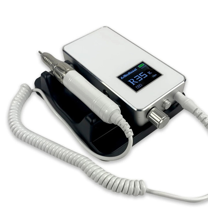 Medicool Pro Power Elite e-file in White lying in its cradle with the handpiece