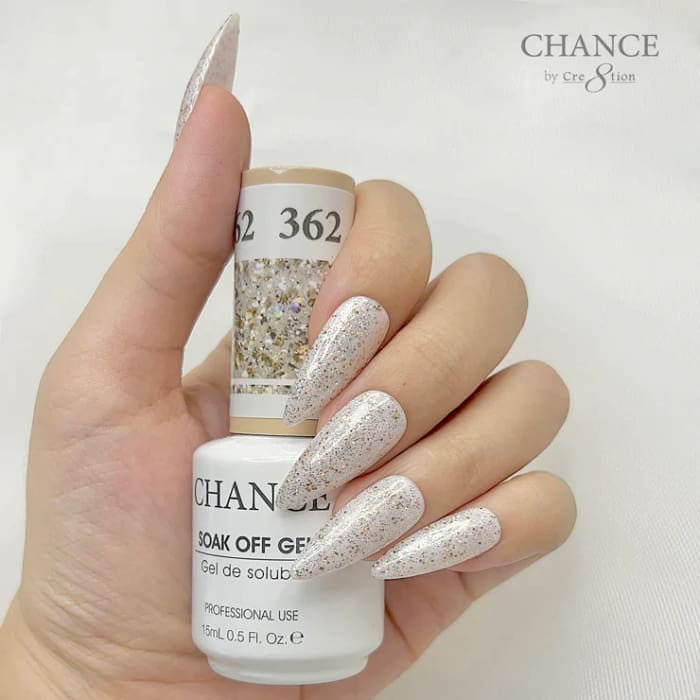 Chance Diamond Dust 362 soak-off gel polish 0.5 oz, bottle held in hand with painted nails