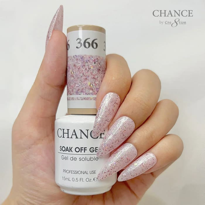 Chance Diamond Dust 366 soak-off gel polish 0.5 oz, bottle held in hand with painted nails