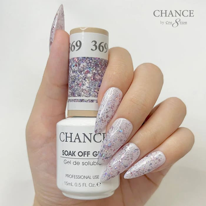 Chance Diamond Dust 369 soak-off gel polish 0.5 oz, bottle held in hand with painted nails