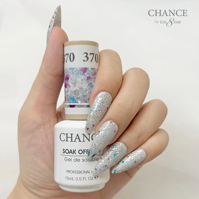 Chance Diamond Dust 370 soak-off gel polish 0.5 oz, bottle held in hand with painted nails