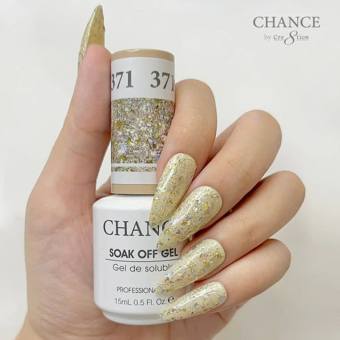 Chance Diamond Dust 371 soak-off gel polish 0.5 oz, bottle held in hand with painted nails
