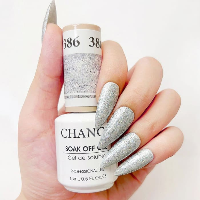 Chance Diamond Dust 386 soak-off gel polish 0.5 oz, bottle held in hand with painted nails