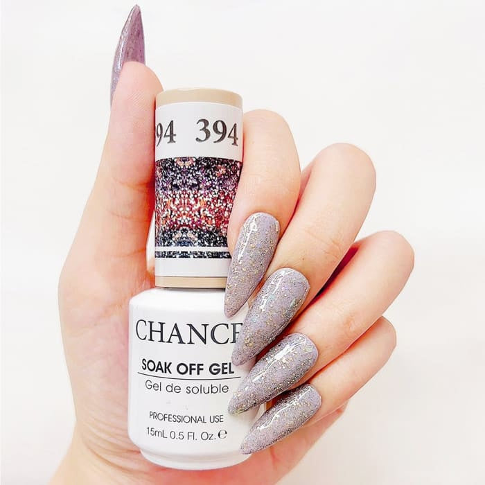 Chance Diamond Dust 394 soak-off gel polish 0.5 oz, bottle held in hand with painted nails