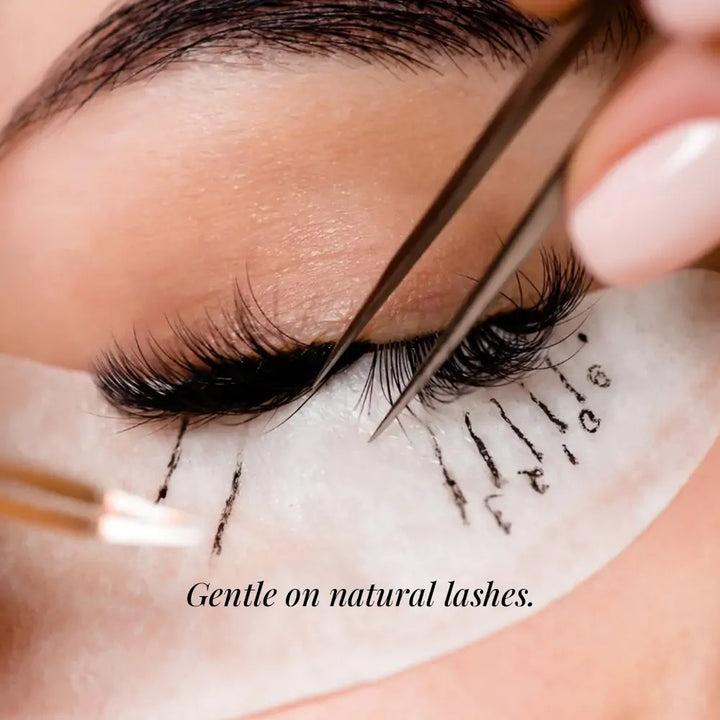 Gollee Thin &amp; Fast Glue A-02, lash extensions being applied with tweezers