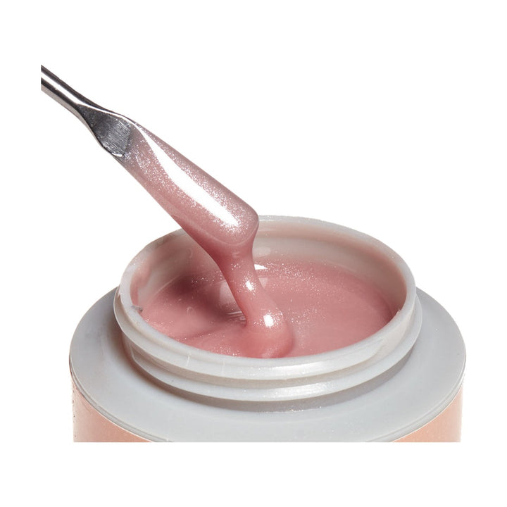 ibd Xtreme Hard Gel Champagne Sparkle 2 oz, gel on a spatula