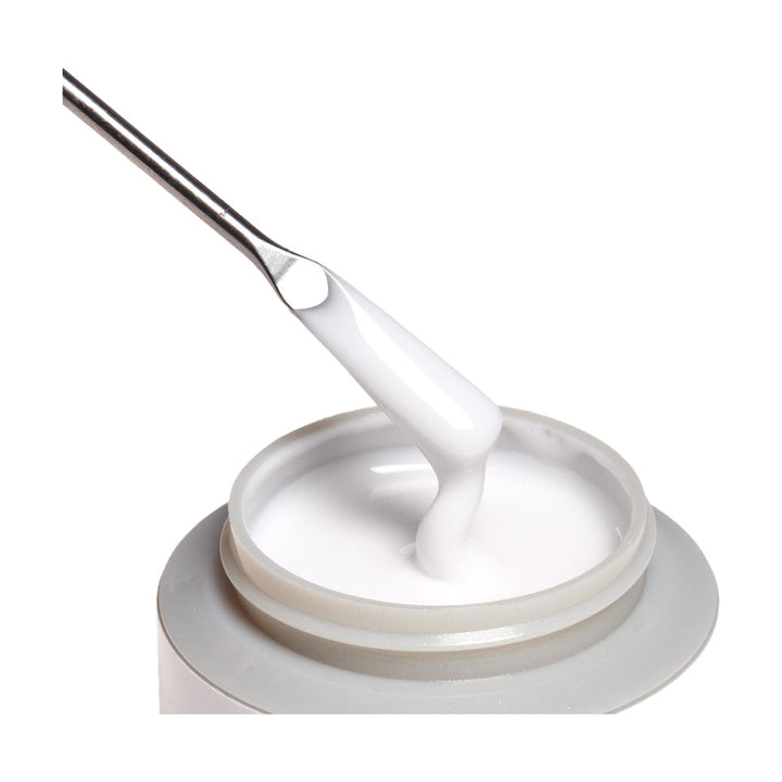 ibd Xtreme Hard Gel Milky White 2 oz, gel on a spatula