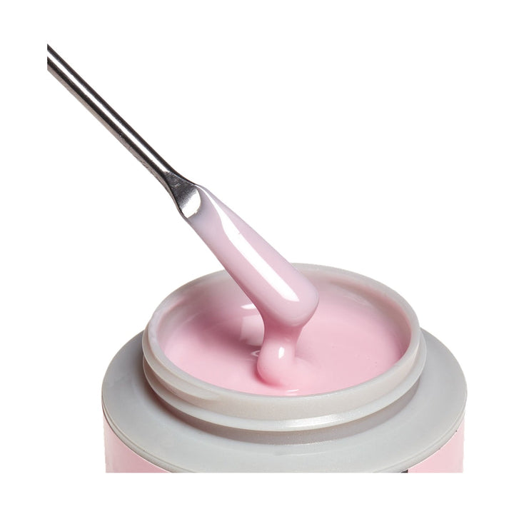 ibd Xtreme Hard Gel Pink Glaze 2 oz, gel on a spatula