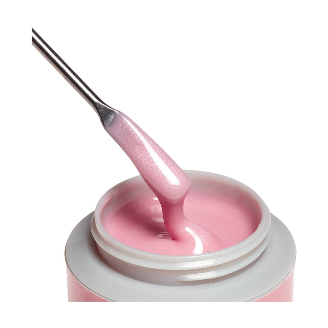 ibd Xtreme Hard Gel Rose Luster 2 oz, gel on a spatula