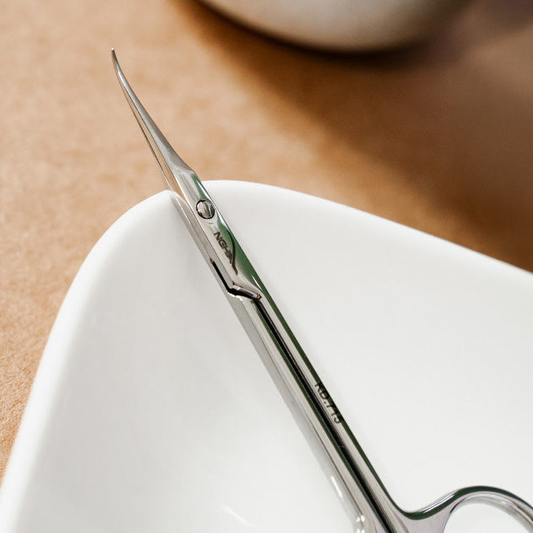 NGHIA KD-715 cuticle scissors in use