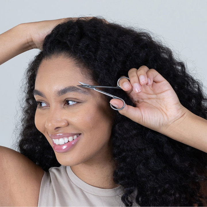 NGHIA KM-605 eyebrow scissors in use