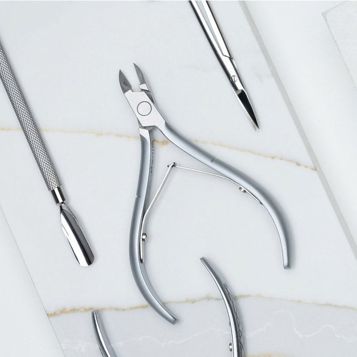 NGHIA D-03 cuticle nipper in use
