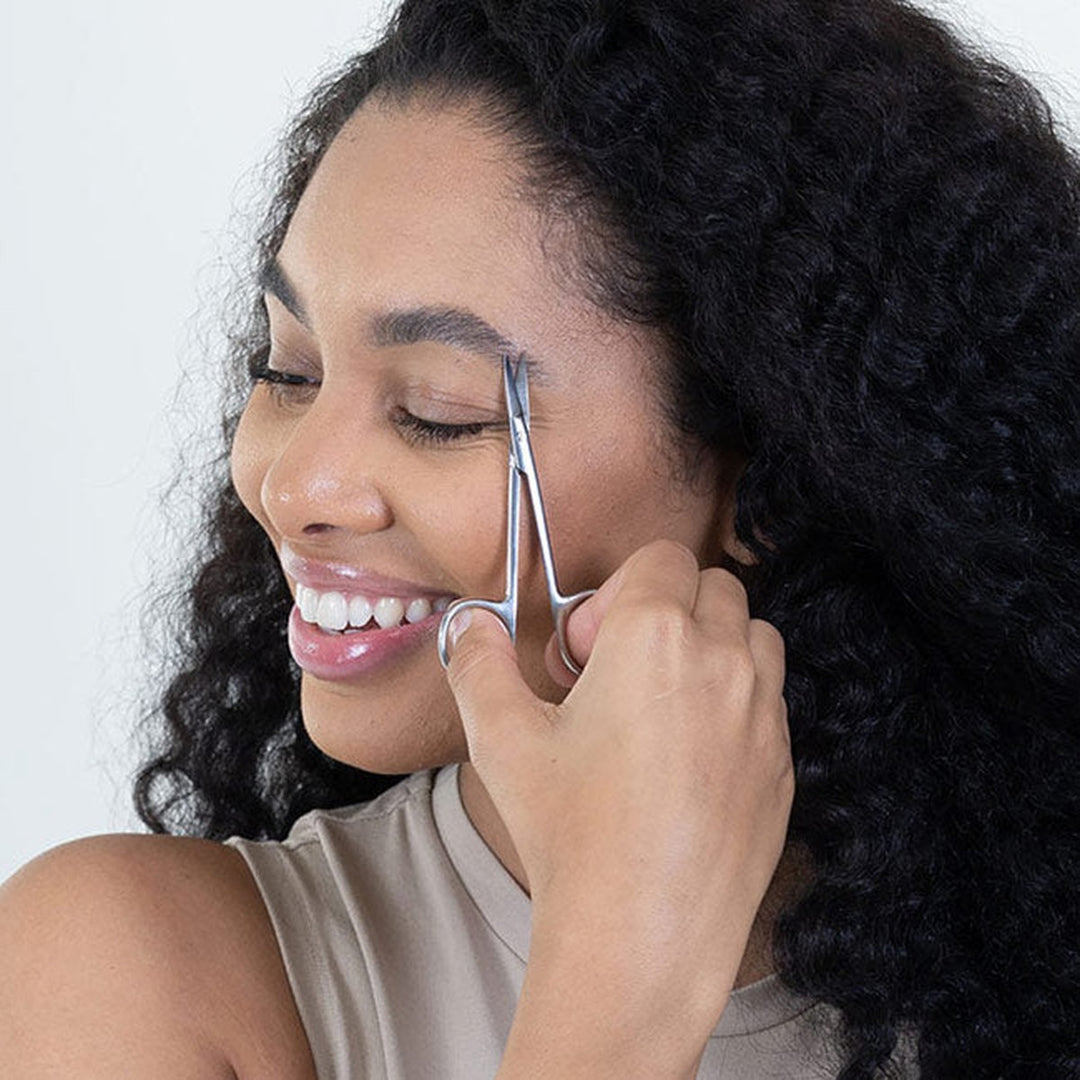 NGHIA KM-603 eyebrow scissors in use